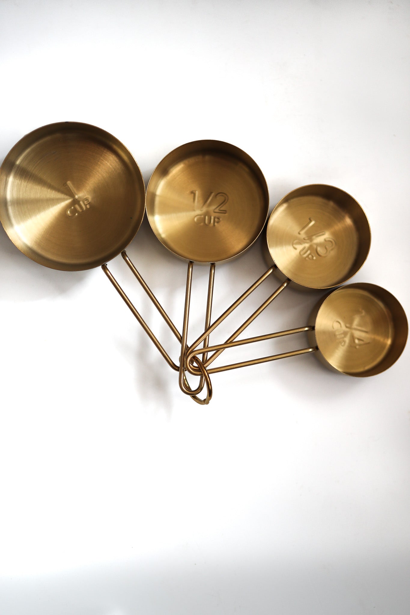 Gold measuring cups