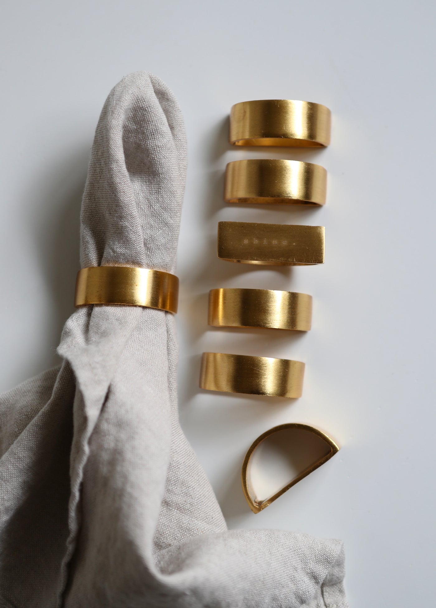 Brass table cloth rings